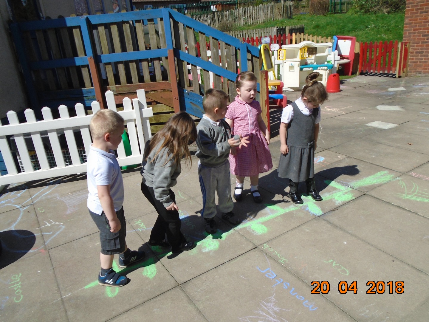 19 4 18 Writing about J and Beanstalk with chalk ..JPG